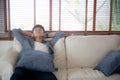 Portrait young handsome asian man napping relax with cozy on sofa at home, asia male resting and sleeping in weekend