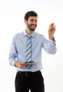 Portrait of a young handsome and confident businessman pointing as touching virtual screen Royalty Free Stock Photo