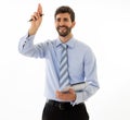 Portrait of a young handsome and confident businessman pointing as touching virtual screen Royalty Free Stock Photo