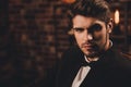 Portrait of young handsome elegant businessman in black suit Royalty Free Stock Photo