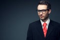 Portrait of young handsome man (businessman) in black suit Royalty Free Stock Photo