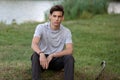 Portrait of a young handsome man outdoors. Teenager Royalty Free Stock Photo