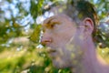 Double exposure of young handsome man with trees and nature Royalty Free Stock Photo