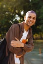 Portrait of young handsome stylish smiling boy with books Royalty Free Stock Photo