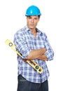 Young handyman with a spirit level against white background. Portrait of young handyman with a spirit level in hand Royalty Free Stock Photo