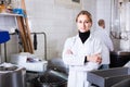 Portrait of young woman working in modern food factory Royalty Free Stock Photo