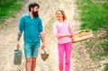 Portrait of a young happy couple in yard during spring season. Small business owner selling organic fruits and Royalty Free Stock Photo