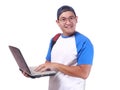 Happy Smiling Young Male Asian Student With Laptop Royalty Free Stock Photo