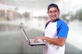 Happy Smiling Young Male Asian Student With Laptop Royalty Free Stock Photo