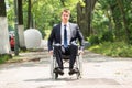 Young Disabled Man On Wheelchair Royalty Free Stock Photo
