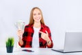 Portrait young happy excited successful young business woman holding money dollar bills in hand. Royalty Free Stock Photo