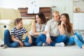 Portrait of young happy family with pretty teenager daughter and Royalty Free Stock Photo