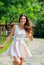 Portrait of a young happy girl walking on the park Royalty Free Stock Photo