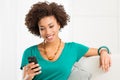Young Woman Looking At Cellphone Royalty Free Stock Photo