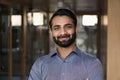 Portrait of young happy indian business man executive looking at camera. Royalty Free Stock Photo