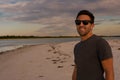 Portrait of Young happy man smiling at beach. Lifesyle concept