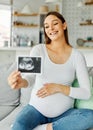 woman ultrasound pregnant mother holding female pregnancy baby belly scan care maternity photo picture motherhood life Royalty Free Stock Photo