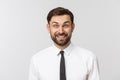 Portrait of young happy smiling business man, isolated over white background Royalty Free Stock Photo