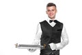 Portrait of young happy smiling waiter with on tray isolated on Royalty Free Stock Photo