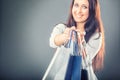 Portrait of young happy smiling woman with shopping bags credit card and shoes Royalty Free Stock Photo