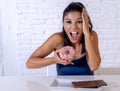 Portrait of young happy woman eating delighted chocolate bar and donuts Royalty Free Stock Photo