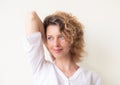 Portrait of a young happy woman massaging her neck. Portrait of Royalty Free Stock Photo