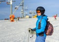 Portrait of young happy woman skier at the ski resort Royalty Free Stock Photo