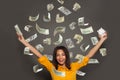 Portrait of a young happy woman winner throwing money banknotes Royalty Free Stock Photo