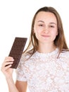 Portrait of young healthy pretty woman holding chocolate bar Royalty Free Stock Photo