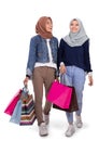 Portrait of young hijab women walking after shopping