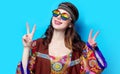 Portrait of Young hippie girl with rainbow glasses