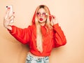 Portrait of young hipster girl posing in studio Royalty Free Stock Photo