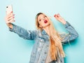 Portrait of young hipster girl posing in studio Royalty Free Stock Photo