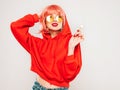 Portrait of young hipster girl posing in studio Royalty Free Stock Photo