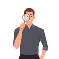 Portrait of young hipster man looking through magnifying glass. Bearded trendy person holding magnifier. Male character design Royalty Free Stock Photo