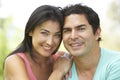 Portrait Of Young Hispanic Couple In Park Royalty Free Stock Photo