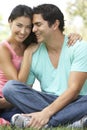 Portrait Of Young Hispanic Couple In Park Royalty Free Stock Photo