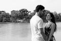 Young Hispanic couple relaxing in the park together Royalty Free Stock Photo