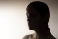 Portrait of young hispanic woman meditating, breathing deeply