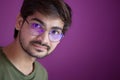 A portrait of young indian handsome boy wearing glasses