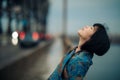 Portrait of young Japanese relaxed woman on the bridge Royalty Free Stock Photo