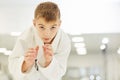 Young karateka working with techniques