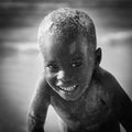 Portrait of a young kid smiling at the camera, Senegal Royalty Free Stock Photo