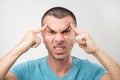 Portrait of young latin angry man. He is furious and shout with anger