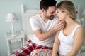 Portrait of young loving couple in bedroom Royalty Free Stock Photo