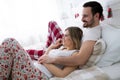 Portrait of young loving couple in bedroom Royalty Free Stock Photo