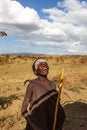 Portrait of young maasai boy after ceremony with white face paint