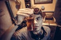 Portrait of a young mad scientist dressed in steampunk style and Royalty Free Stock Photo