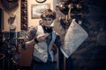 Portrait of a young mad scientist traveler in a steampunk style Royalty Free Stock Photo