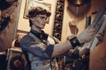 Portrait of a young mad scientist traveler in a steampunk style Royalty Free Stock Photo
